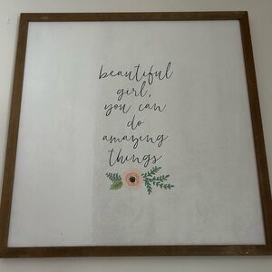 canvas that says “ beautiful girl, you can do amazing things”